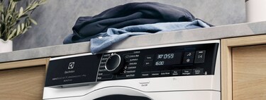 laundry room with washing machine and tumble dryer